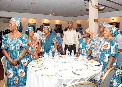 Members of the National Council for Women Societies singing the Nigerian National Anthem