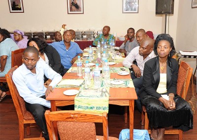The Chairman and Members of Utako Market traders association listening carefully to the presentation